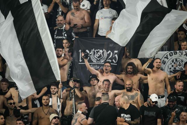 Ofi Crete supporters cheer their team on from the stands during the UEFA Europa League, league phase matchday 2, football match between Stade Rennais and OFI Crete at the Roazhon Park in Rennes, western France on October 15, 2026. (Photo by Loic VENANCE / AFP)