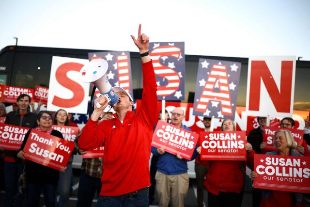 Supporters of US Senator Susan Collins, Republican from Maine, gather before her debate with Democratic candidate for the US Senate Troy Jackson at the Gracie Theatre in Bangor, Maine, on October 15, 2026. Jackson is looking to unseat the five-term senator in November's midterm election. Americans voting in the November 3 midterm elections will decide who controls Congress for the final two years of Donald Trump's presidency, along with dozens of governorships and thousands of state offices. (Photo by CHARLY TRIBALLEAU / AFP)