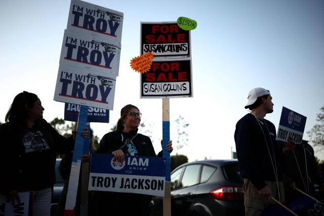Supporters of Democratic candidate for the US Senate Troy Jackson gather before his debate with US Senator Susan Collins, Republican from Maine, at the Gracie Theatre in Bangor, Maine, on October 15, 2026. Jackson is looking to unseat the five-term senator in November's midterm election. Americans voting in the November 3 midterm elections will decide who controls Congress for the final two years of Donald Trump's presidency, along with dozens of governorships and thousands of state offices. (Photo by CHARLY TRIBALLEAU / AFP)