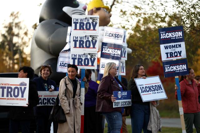 Supporters of Democratic candidate for the US Senate Troy Jackson gather before his debate with US Senator Susan Collins, Republican from Maine, at the Gracie Theatre in Bangor, Maine, on October 15, 2026. Jackson is looking to unseat the five-term senator in November's midterm election. Americans voting in the November 3 midterm elections will decide who controls Congress for the final two years of Donald Trump's presidency, along with dozens of governorships and thousands of state offices. (Photo by CHARLY TRIBALLEAU / AFP)