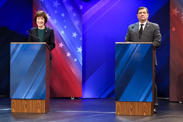 US Senator Susan Collins (R-ME) and Democratic candidate for the US Senate Troy Jackson are seen during their debate at the Gracie Theatre in Bangor, Maine on October 15, 2026. Jackson is looking to unseat the five-term senator in November's midterm election. Americans voting in the November 3 midterm elections will decide who controls Congress for the final two years of Donald Trump's presidency, along with dozens of governorships and thousands of state offices. (Photo by CHARLY TRIBALLEAU / AFP)