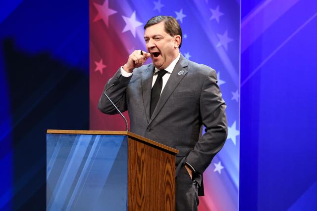 Democratic candidate for US Senate Troy Jackson yawns as he awaits questions from the panel during a debate with US Senator Susan Collins (R-ME) at the Gracie Theatre in Bangor, Maine on October 15, 2026. Jackson is looking to unseat the five-term senator in November's midterm election. Americans voting in the November 3 midterm elections will decide who controls Congress for the final two years of Donald Trump's presidency, along with dozens of governorships and thousands of state offices. (Photo by CHARLY TRIBALLEAU / AFP)