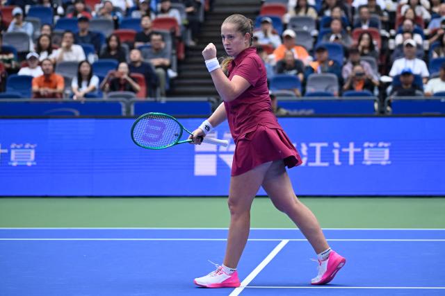 Latvia's Jelena Ostapenko reacts after a point against Russia's Diana Shnaider during their women's singles quarter final match at the Wuhan Open tennis tournament in Wuhan, China's Hubei province on October 16, 2026. (Photo by WANG Zhao / AFP)