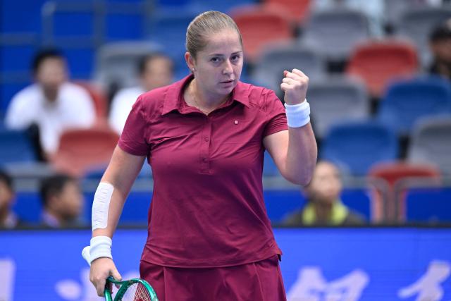 Latvia's Jelena Ostapenko reacts after a point against Russia's Diana Shnaider during their women's singles quarter final match at the Wuhan Open tennis tournament in Wuhan, China's Hubei province on October 16, 2026. (Photo by WANG Zhao / AFP)