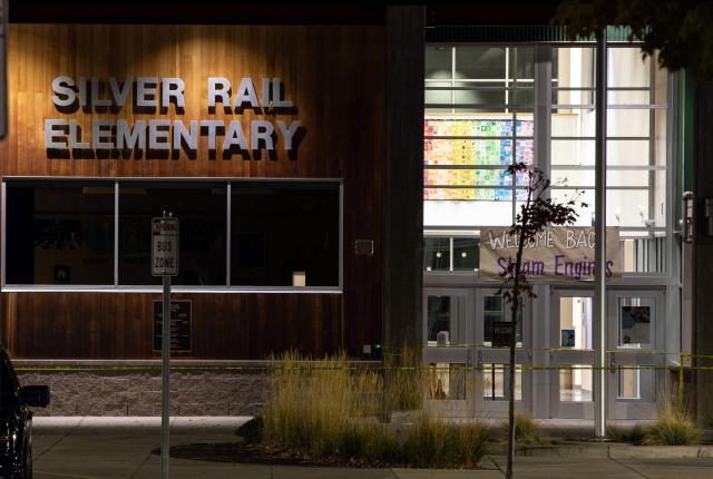 The main entrance of Silver Rail Elementary School is seen following a shooting in Bend, Oregon, on October 15, 2026. Three children and one teacher were shot dead at an elementary school Thursday in the northwestern US state of Oregon, police said, adding that the assailant was a 16-year-old who was killed by an armed bystander. (Photo by Payton Bruni / AFP)
