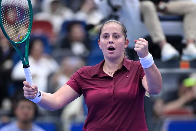 Latvia's Jelena Ostapenko reacts after a point against Russia's Diana Shnaider during their women's singles quarter final match at the Wuhan Open tennis tournament in Wuhan, China's Hubei province on October 16, 2026. (Photo by WANG Zhao / AFP)