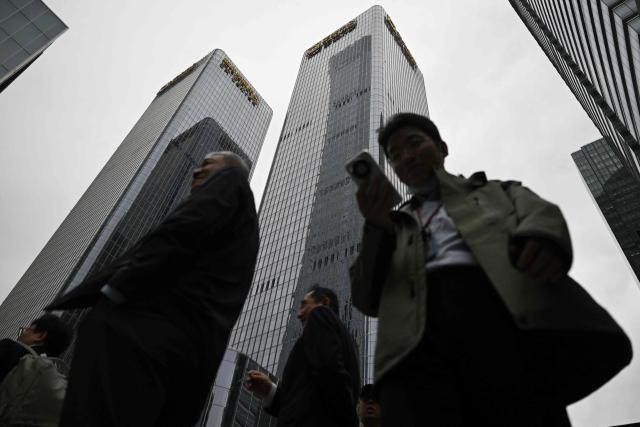 The building (C) where the Zhong Lun Law Firm is located, where new White House Press Secretary Katie Zacharia previously worked as a lawyer, is pictured in Beijing on October 16, 2026. (Photo by Pedro PARDO / AFP)