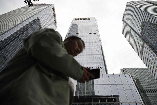 The building (C) where the Zhong Lun Law Firm is located, where new White House Press Secretary Katie Zacharia previously worked as a lawyer, is pictured in Beijing on October 16, 2026. (Photo by Pedro PARDO / AFP)
