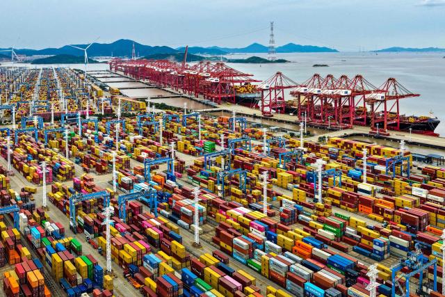 Containers are seen at the Ningbo-Zhoushan port in Ningbo, in China's eastern Zhejiang Province on October 15, 2026. (Photo by CN-STR / AFP) / China OUT