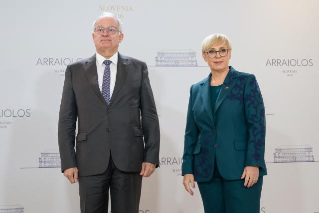 Greece's president Konstantinos Tasoulas (L) is welcomed by Slovenia's President Natasa Pirc Musar (R) upon arrival at the 21st Arraiolos Meeting of non-executive EU heads of state in Brdo pri Kranju on October 16, 2026. (Photo by Jure Makovec / AFP)