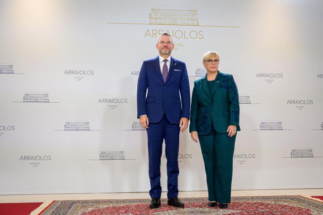 Slovakia's president Peter Pellegrini (L) is welcomed by Slovenia's President Natasa Pirc Musar (R) upon arrival at the 21st Arraiolos Meeting of non-executive EU heads of state in Brdo pri Kranju on October 16, 2026. (Photo by Jure Makovec / AFP)