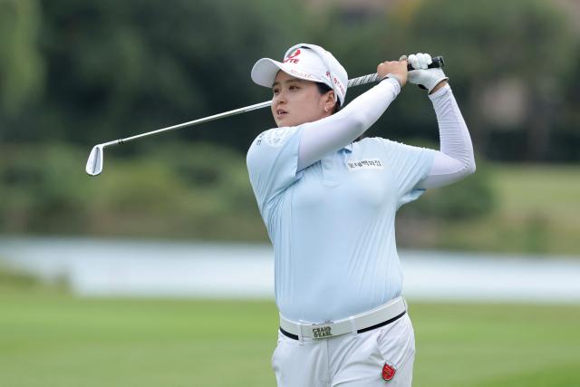 South Korea's Choi Hye-jin hits a shot during the Buick LPGA Shanghai golf tournament in Shanghai on October 16, 2026. (Photo by CN-STR / AFP) / China OUT