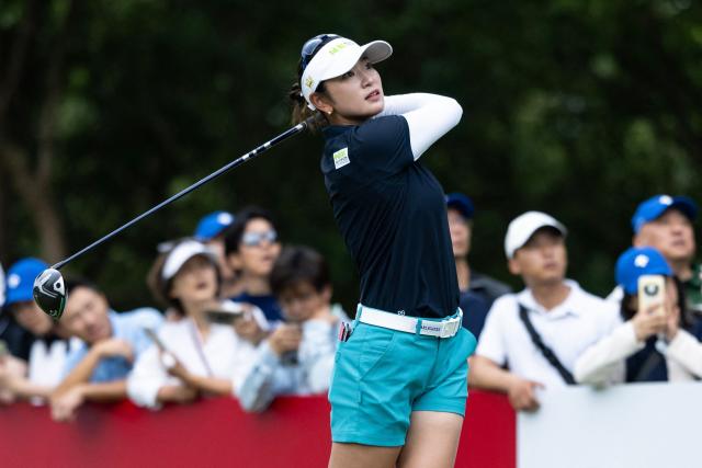Japan's Erika Hara plays a shot during the Buick LPGA Shanghai golf tournament in Shanghai on October 16, 2026. (Photo by CN-STR / AFP) / China OUT