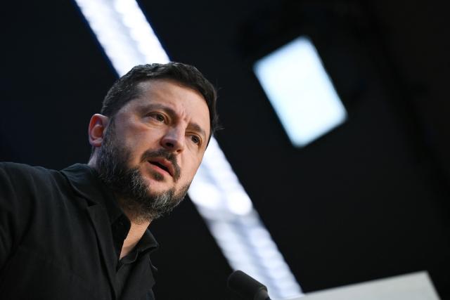 Ukraine's President Volodymyr Zelensky speaks during a press conference as part of a European Union summit at the EU headquarters in Brussels on October 16, 2026. EU leaders headed to Brussels on October 15, 2026, for their biggest clash yet over the bloc’s next long-term budget, as they race to lock in a deal before next year’s French presidential election. (Photo by Nicolas TUCAT / AFP)