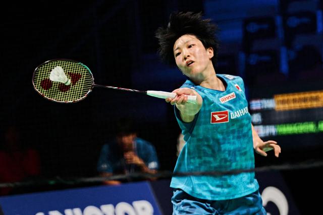 Akane Yamaguchi from Japan in action against Pornpawee Chochuwong from Thailand (unseen) in the women's singles quarterfinal at the Denmark Open in badminton at SJF Bank Arena in Odense on October 16, 2026. (Photo by Thomas Traasdahl / Ritzau Scanpix / AFP) / Denmark OUT