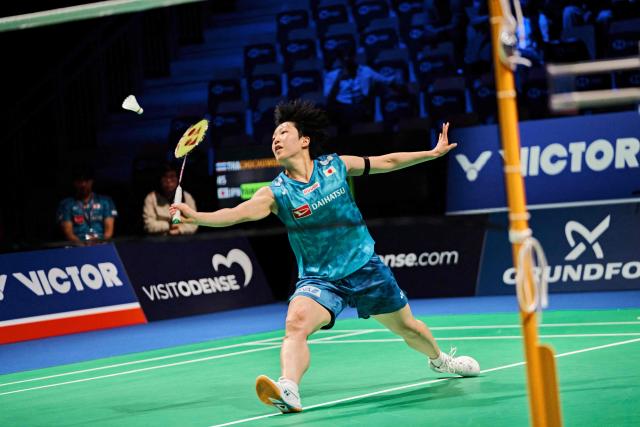 Akane Yamaguchi from Japan in action against Pornpawee Chochuwong from Thailand (unseen) in the women's singles quarterfinal at the Denmark Open in badminton at SJF Bank Arena in Odense on October 16, 2026. (Photo by Thomas Traasdahl / Ritzau Scanpix / AFP) / Denmark OUT