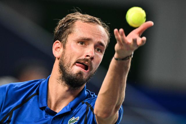 Russia's Daniil Medvedev serves to USA's Tommy Paul during their men's singles quarter-final match at the Shanghai Masters tennis tournament in Shanghai on October 16, 2026. (Photo by Hector RETAMAL / AFP)