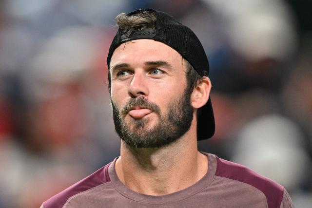 USA's Tommy Paul reacts during his men's singles quarter-final match against Russia's Daniil Medvedev at the Shanghai Masters tennis tournament in Shanghai on October 16, 2026. (Photo by Hector RETAMAL / AFP)