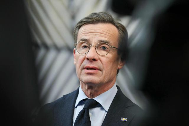 Sweden's Prime Minister Ulf Kristersson delivers a doorstep statement during the EU summit in Brussels on October 16, 2026. EU leaders headed to Brussels on October 15, 2026, for their biggest clash yet over the bloc’s next long-term budget, as they race to lock in a deal before next year’s French presidential election. (Photo by NICOLAS TUCAT / AFP)