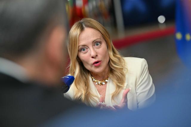 Italy's Prime Minister Giorgia Meloni makes a doorstep statement at the end of a European Union summit at the EU headquarters in Brussels on October 16, 2026. EU leaders head on October 15, 2026 for their biggest clash yet over the bloc's next long-term budget, as they race to lock in a deal before next year's French presidential election. (Photo by NICOLAS TUCAT / AFP)