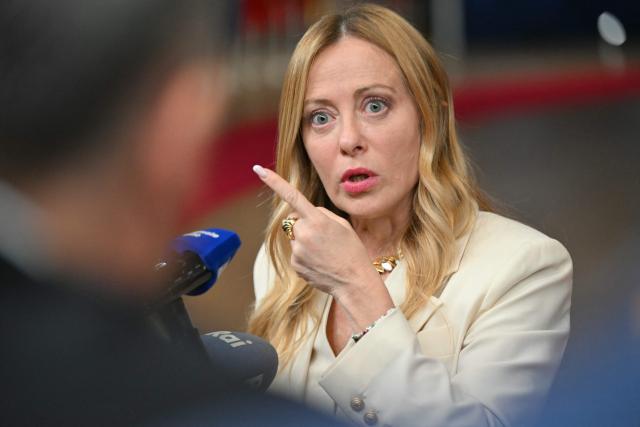 Italy's Prime Minister Giorgia Meloni makes a doorstep statement at the end of a European Union summit at the EU headquarters in Brussels on October 16, 2026. EU leaders head on October 15, 2026 for their biggest clash yet over the bloc's next long-term budget, as they race to lock in a deal before next year's French presidential election. (Photo by NICOLAS TUCAT / AFP)