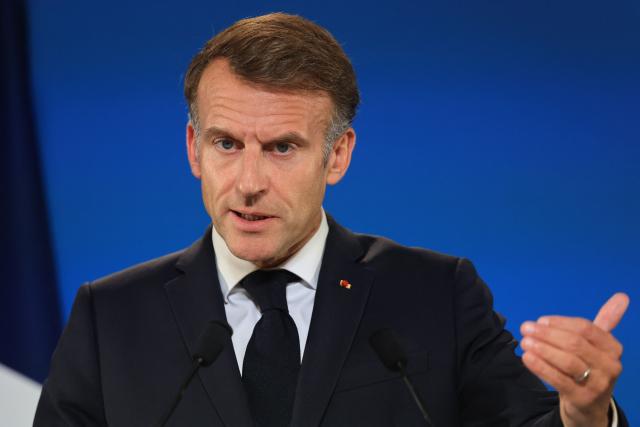 France's President Emmanuel Macron gives a press conference at the end of a European Union summit at the EU headquarters in Brussels on October 16, 2026. EU leaders head on October 15, 2026 for their biggest clash yet over the bloc's next long-term budget, as they race to lock in a deal before next year's French presidential election. (Photo by Ludovic MARIN / AFP)