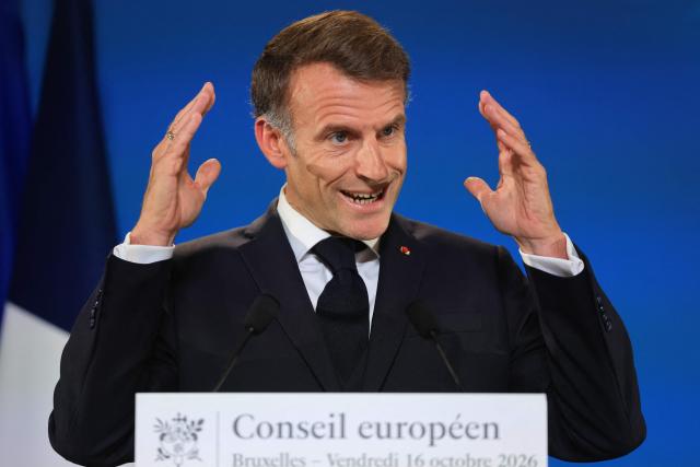France's President Emmanuel Macron gives a press conference at the end of a European Union summit at the EU headquarters in Brussels on October 16, 2026. EU leaders head on October 15, 2026 for their biggest clash yet over the bloc's next long-term budget, as they race to lock in a deal before next year's French presidential election. (Photo by Ludovic MARIN / AFP)