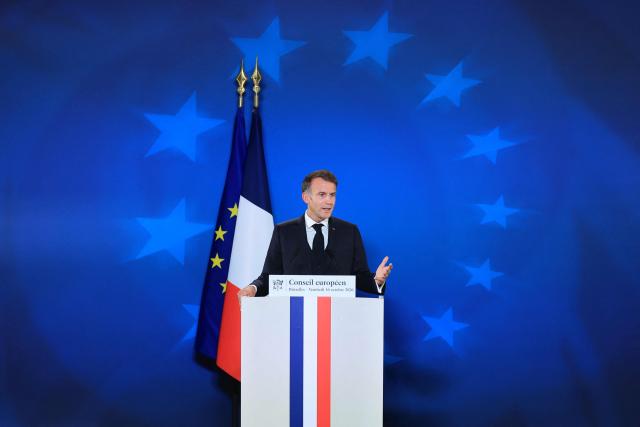 France's President Emmanuel Macron gives a press conference at the end of a European Union summit at the EU headquarters in Brussels on October 16, 2026. EU leaders head on October 15, 2026 for their biggest clash yet over the bloc's next long-term budget, as they race to lock in a deal before next year's French presidential election. (Photo by Ludovic MARIN / AFP)