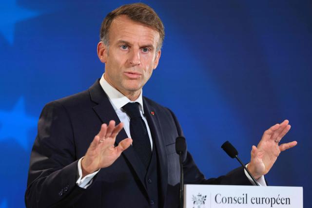 France's President Emmanuel Macron gives a press conference at the end of a European Union summit at the EU headquarters in Brussels on October 16, 2026. EU leaders head on October 15, 2026 for their biggest clash yet over the bloc's next long-term budget, as they race to lock in a deal before next year's French presidential election. (Photo by Ludovic MARIN / AFP)
