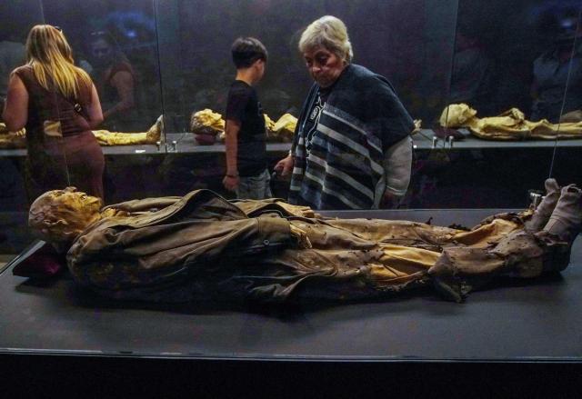 Tourists visit the Mummy Museum in the colonial city of Guanajuato, Guanajuato state, Mexico, on October 15, 2026. The museum displays naturally mummified human remains recovered from the city's Santa Paula cemetery. (Photo by Mario ARMAS / AFP)