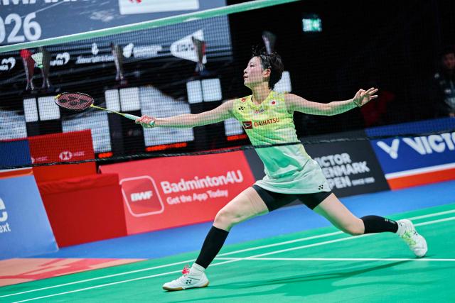 Japan's Tomoka Miyazaki plays against Japan's Nozomi Okuhara (not in picture) during the women's singles quarter-final badminton match at the Denmark Open at the SJF Bank Arena in Odense on October 16, 2026. (Photo by Thomas Traasdahl / Ritzau Scanpix / AFP) / Denmark OUT
