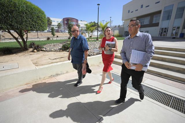 Members of the prosecution team arrive at the civil court facilities in Ensenada, Baja California state, Mexico, on October 16, 2026, ahead of the sentencing of three suspects accused of murdering Australian brothers Callum and Jake Robinson and US citizen Jack Carter Rhoad during a surfing trip in April 2024. Mexican judge on October 16, 2026, is expected to issue sentences for three men convicted of murdering two Australian surfers and their American friend in 2024, in a case that drew global condemnation. (Photo by Guillermo Arias / AFP)
