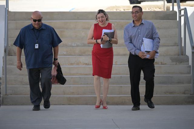 Members of the prosecution team arrive at the civil court facilities in Ensenada, Baja California state, Mexico, on October 16, 2026, ahead of the sentencing of three suspects accused of murdering Australian brothers Callum and Jake Robinson and US citizen Jack Carter Rhoad during a surfing trip in April 2024. Mexican judge on October 16, 2026, is expected to issue sentences for three men convicted of murdering two Australian surfers and their American friend in 2024, in a case that drew global condemnation. (Photo by Guillermo Arias / AFP)