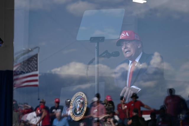 US President Donald Trump speaks at a midterm campaign rally at Dalton Municipal Airport in Dalton, Georgia, on October 16, 2026. Trump is campaigning for US Representative Mike Collins for US Senate and Rick Jackson for governor. (Photo by Brendan SMIALOWSKI / AFP)