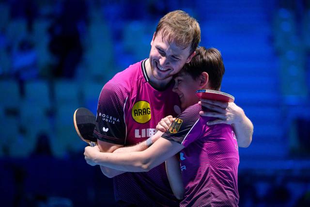 Germany’s Nina Mittelham (R) and Benedikt Duda celebrate after winning the Mixed Doubles final match of the 2026 ETTU European Individual Table Tennis Championships at the Arena Stozice in Ljubljana, Slovenia on October 16, 2026. (Photo by Jure Makovec / AFP)