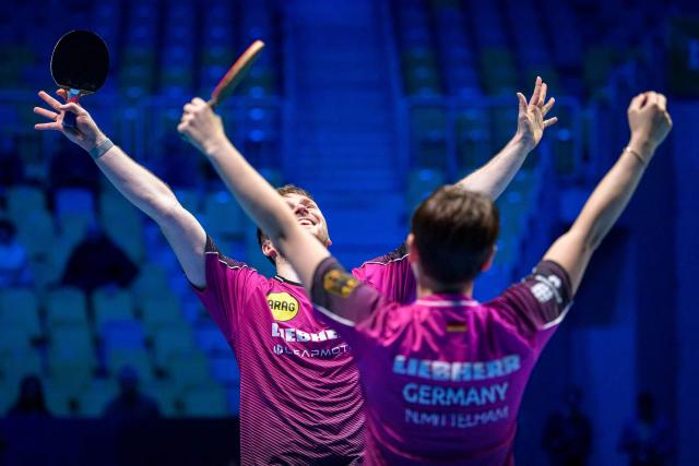 Germany’s Nina Mittelham (R) and Benedikt Duda celebrate after winning the Mixed Doubles final match of the 2026 ETTU European Individual Table Tennis Championships at the Arena Stozice in Ljubljana, Slovenia on October 16, 2026. (Photo by Jure Makovec / AFP)