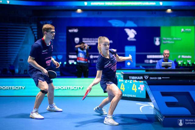 France’s Charlote Lutz (R) and Alexis Lebrun compete during the Mixed Doubles final match of the 2026 ETTU European Individual Table Tennis Championships at the Arena Stozice in Ljubljana, Slovenia on October 16, 2026. (Photo by Jure Makovec / AFP)