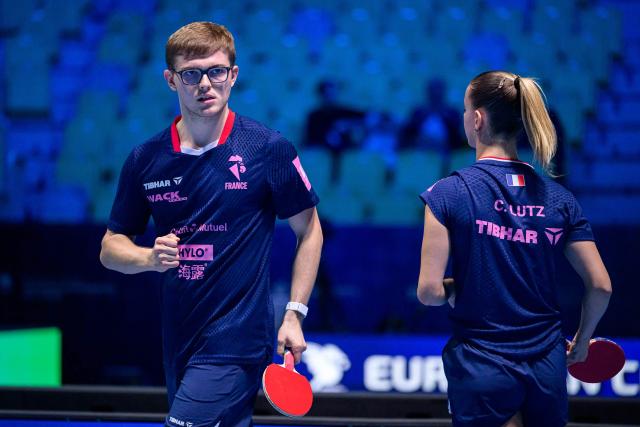 France’s Charlote Lutz (R) and Alexis Lebrun react during the Mixed Doubles final match of the 2026 ETTU European Individual Table Tennis Championships at the Arena Stozice in Ljubljana, Slovenia on October 16, 2026. (Photo by Jure Makovec / AFP)