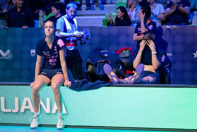 France’s Charlote Lutz (L) and Alexis Lebrun react after losing the Mixed Doubles final match of the 2026 ETTU European Individual Table Tennis Championships at the Arena Stozice in Ljubljana, Slovenia on October 16, 2026. (Photo by Jure Makovec / AFP)