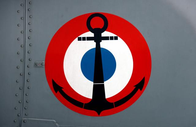 (FILES) This photograph shows the French navy logo on the warship stealth frigate La Fayette during a mission in the Mediterranean Sea on October 26, 2020. The French Navy seized more than 8.6 tonnes of drugs, mainly cocaine, during a series of interdiction operations conducted in the Caribbean Sea and the Atlantic Ocean in early October 2026, AFP learned from authorities on October 16, 2026. (Photo by THOMAS COEX / AFP)