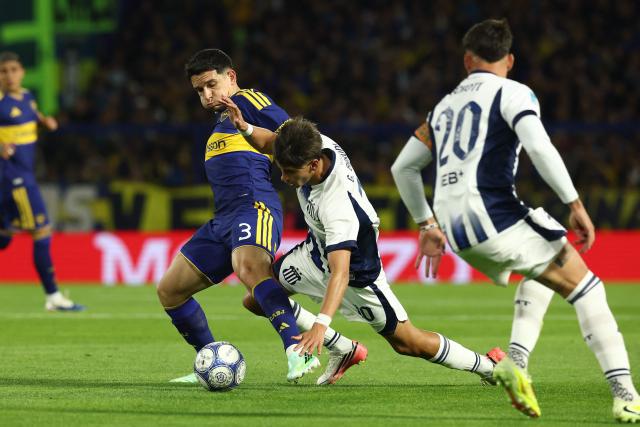 Boca Juniors' defender #03 Lautaro Blanco and Talleres' midfielder #10 Giovanni Baroni fight for the ball during the Argentine Professional League 2026 Clausura tournament football match between Boca Juniors and Talleres de Cordoba at La Bombonera stadium in Buenos Aires on October 16, 2026. (Photo by Alejandro PAGNI / AFP)