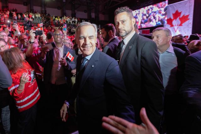 Canadian Prime Minister Mark Carney walks through the crowd at a rally hosted by Forever Canadian on Canadian Unity at the Edmonton Expo Center in Edmonton, Alberta, Canada on October 16, 2026. Alberta voters decide next week if they want the oil-rich province to begin the process of separating from Canada, a pivotal test for the country as it confronts a hostile United States. (Photo by Megan Albu / AFP)