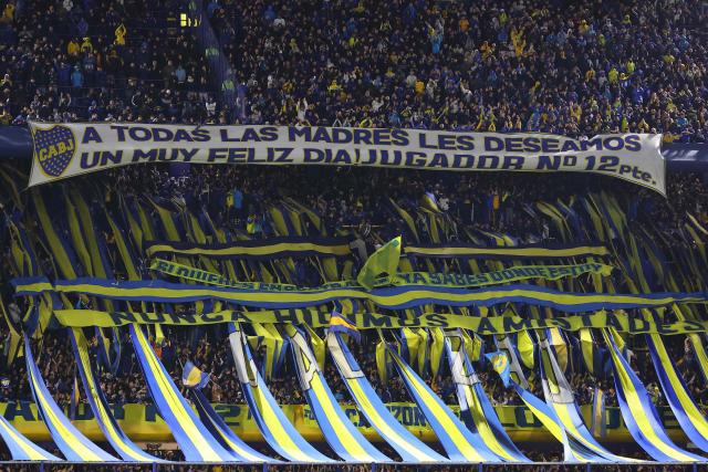 Boca Juniors fans cheer during the Argentine Professional League 2026 Clausura tournament football match between Boca Juniors and Talleres de Cordoba at La Bombonera stadium in Buenos Aires on October 16, 2026. (Photo by Alejandro PAGNI / AFP)