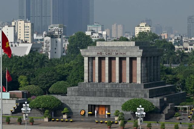 Soldiers stand guard outside the Ho Chi Minh Mausoleum in Hanoi on October 17, 2026. (Photo by Nhac NGUYEN / AFP)