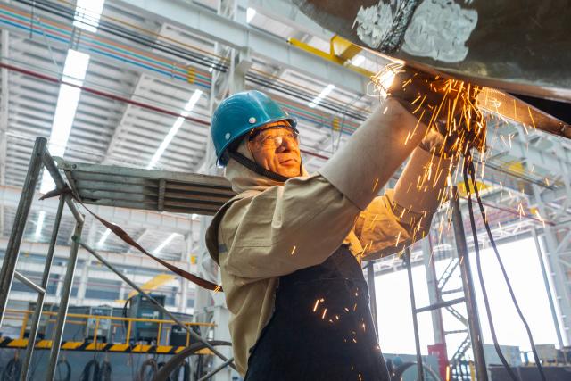 A worker welds at the production workshop of Nantong Hongbo Technology in Nantong, in eastern China's Jiangsu province, on October 15, 2026. (Photo by CN-STR / AFP) / China OUT