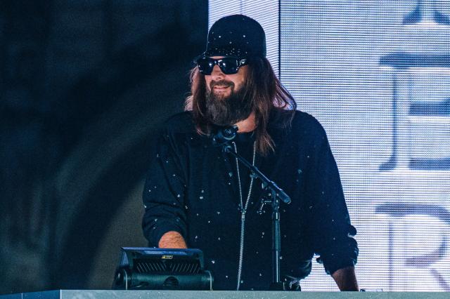 French Artist Sebastien Tellier performs during the "Angele Instinct Release Party", a surprise party organised by the Belgian singer Angele to celebrate the release of her new album "Instinct" at Grand Place square, central Brussels,on October 16, 2026. (Photo by EMILE WINDAL / Belga / AFP) / Belgium OUT