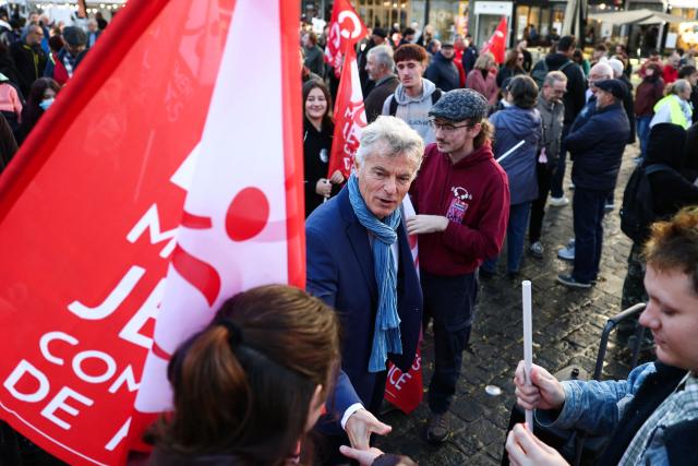 Communist Party (PCF) candidate in France's 2027 presidential election Fabien Roussel (C) attends a demonstration to protest against the "high cost of living", in Valenciennes, northern France, on October 17, 2026 as part of a nationwide call for mobilisation bringing together various groups expressing their anger: former "Yellow Vests", secondary school and university students, climate activists and even farmers. After weeks of student protests, France faces broader, nationwide demonstrations on October 17, 2026 over the cost of living, setting up a potentially fraught six months heading into a presidential election. A police source told AFP that authorities estimated nearly 200,000 people could take part, with 40,000 in Paris. (Photo by Sameer AL-DOUMY / AFP)