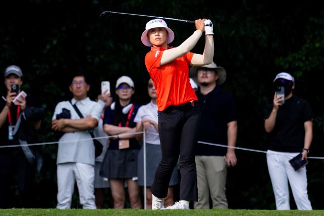 South Korea's Amy Yang plays a shot during the Buick LPGA Shanghai golf tournament in Shanghai on October 17, 2026. (Photo by CN-STR / AFP) / China OUT
