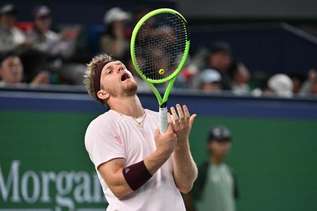 Spain's Alejandro Davidovich Fokina reacts between point against Germany's Alexander Zverev during their men's singles semi-final match at the Shanghai Masters tennis tournament in Shanghai on October 17, 2026. (Photo by Hector RETAMAL / AFP)
