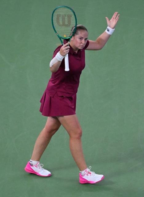 Latvia's Jelena Ostapenko reacts after a point against Sonay Kartal during their women's singles semi-final match at the Wuhan Open tennis tournament in Wuhan, China's Hubei province on October 17, 2026. (Photo by WANG Zhao / AFP)